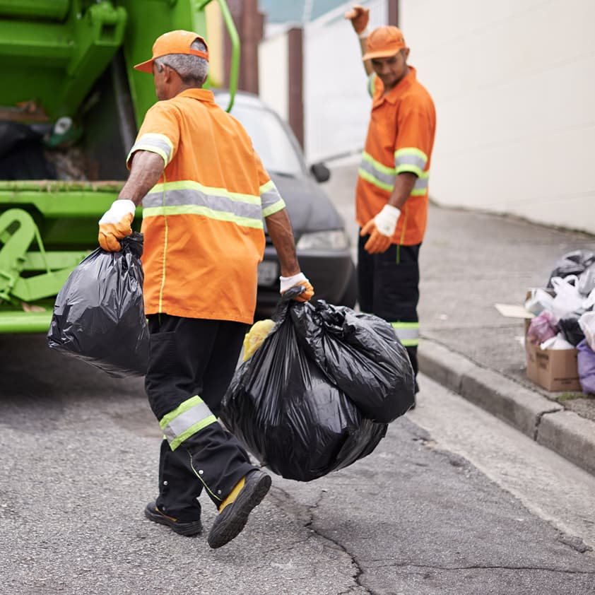 Workers in orange safety gear